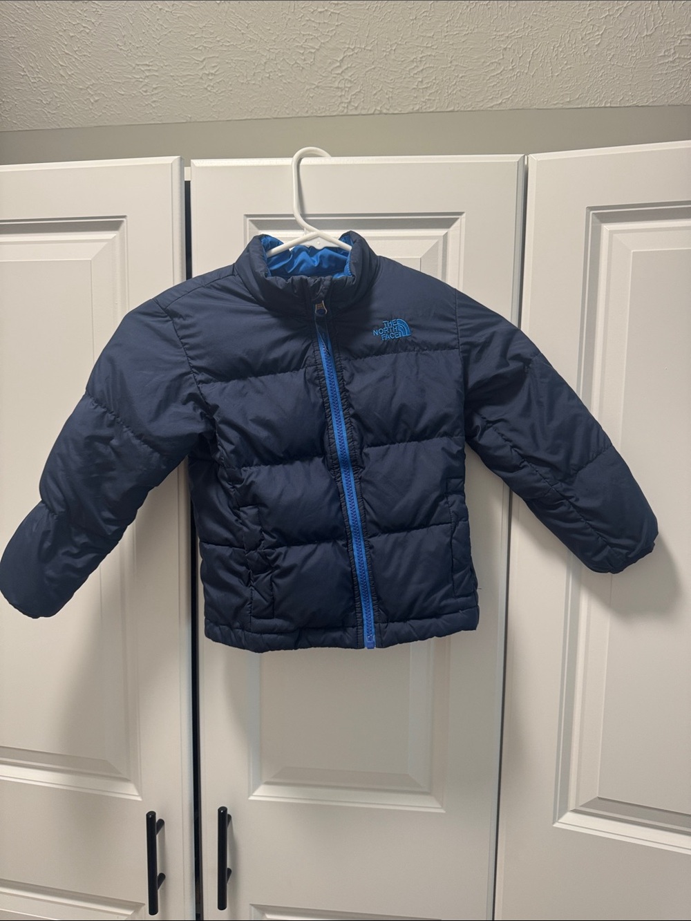 The North Face Navy Jacket with Bright Blue Accents